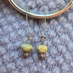 Elegant Green and Bronze Tone Dangle Earrings